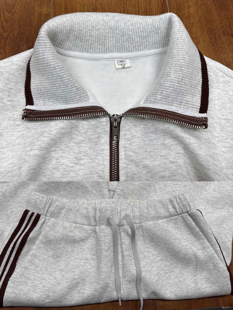 Cozy women's loungewear: half-zip sweatshirt and wide-leg trousers, an ideal comfortable two-piece set.