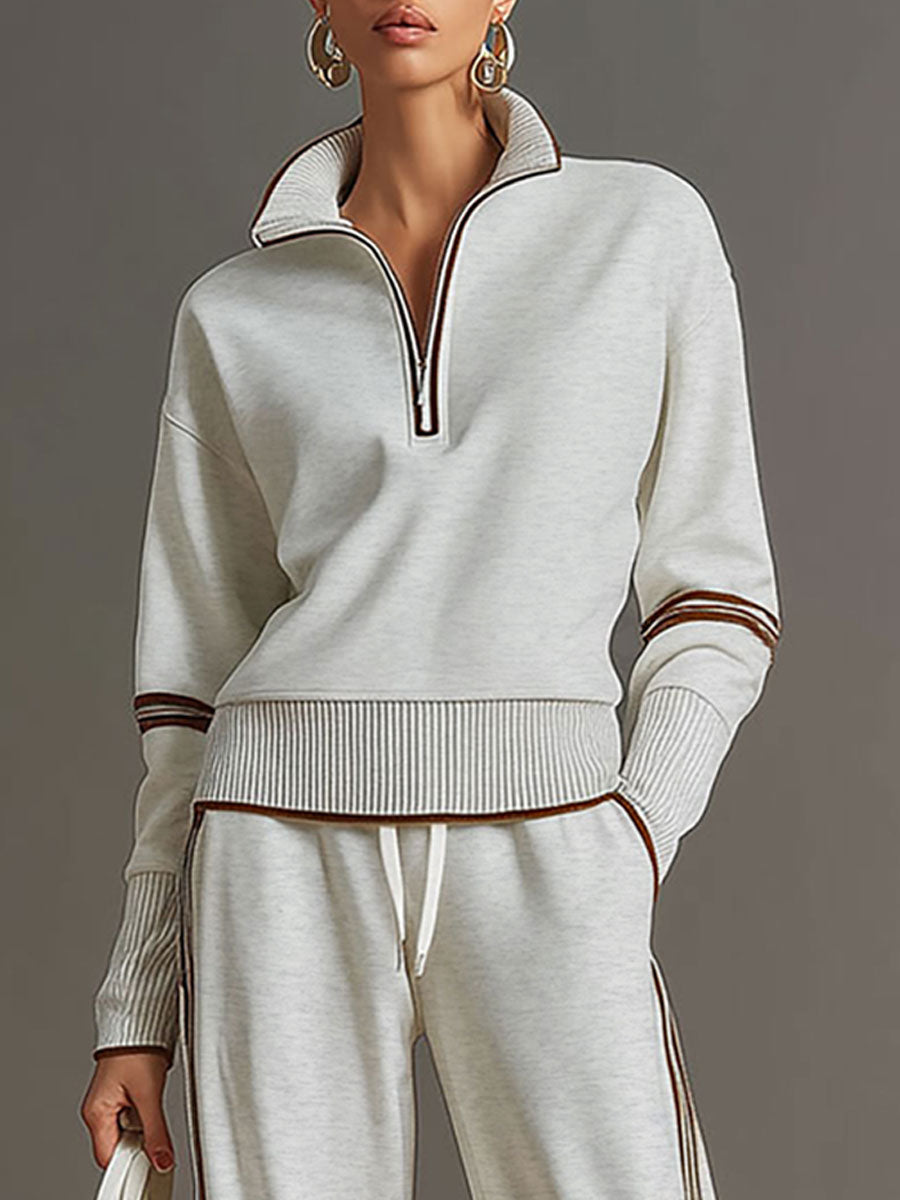 Effortless style: women's half-zip sweatshirt and wide-leg trouser co-ord set, perfect for home or out.