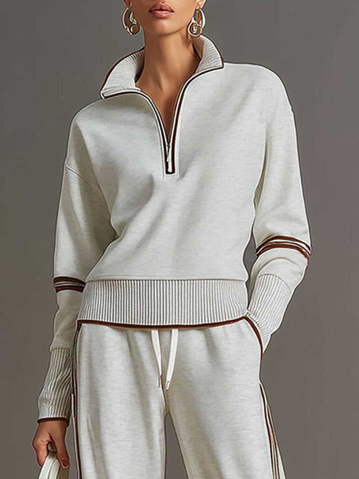 Effortless style: women's half-zip sweatshirt and wide-leg trouser co-ord set, perfect for home or out.