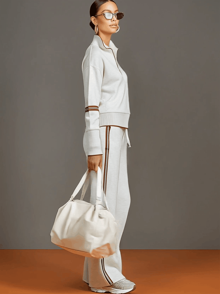 Comfortable women's loungewear set featuring a half-zip top and fashionable wide-leg pants.