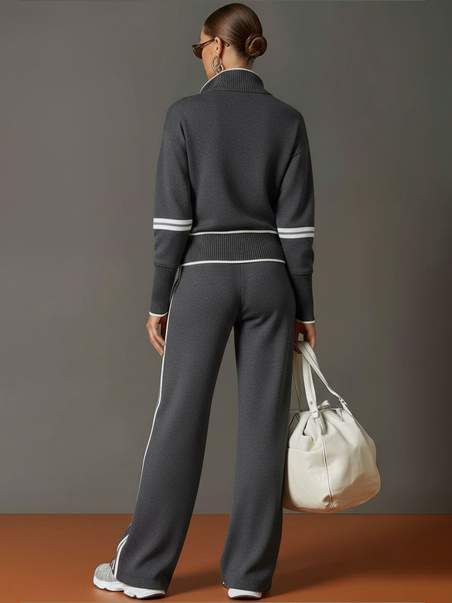 Woman modeling a chic half-zip sweatshirt and wide-leg trouser co-ord set, perfect for casual fashion.