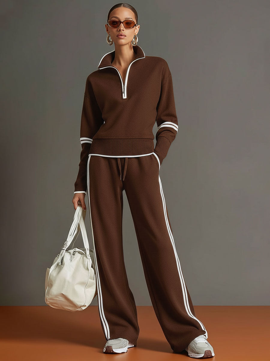 Relaxed fit women's two-piece set: trendy half-zip top and comfy wide-leg trousers, ideal loungewear.