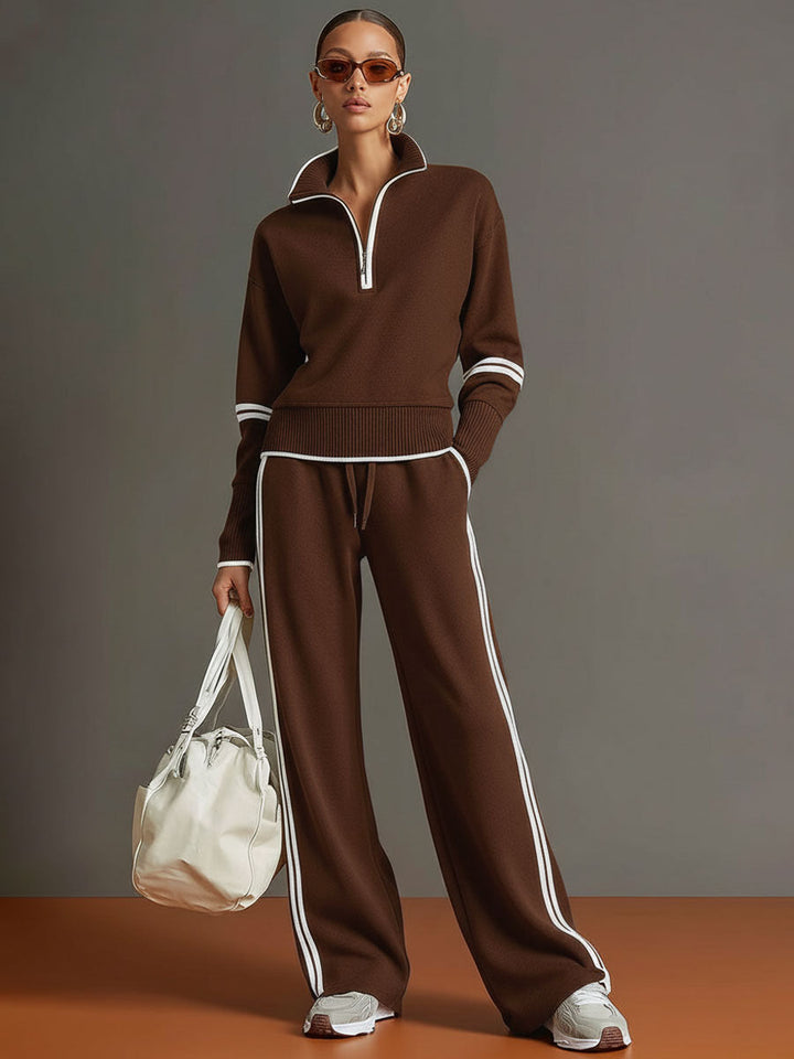 Relaxed fit women's two-piece set: trendy half-zip top and comfy wide-leg trousers, ideal loungewear.