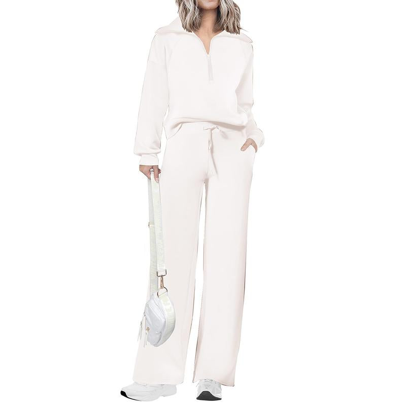 Women's coordinated half-zip top and wide-leg pant two-piece lounge set for casual wear.