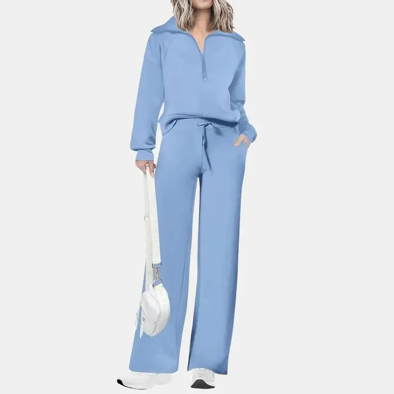 Stylish women's half-zip lounge two-piece set with wide-leg pants, perfect for cozy comfort and casual wear.