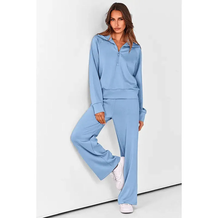 Chic women's half-zip two-piece lounge set. Features a comfortable viscose blend and trendy wide-leg pants.