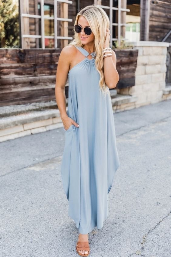 Sleeveless women's halter maxi dress with pockets. Effortless summer fashion & beach vacation ready.