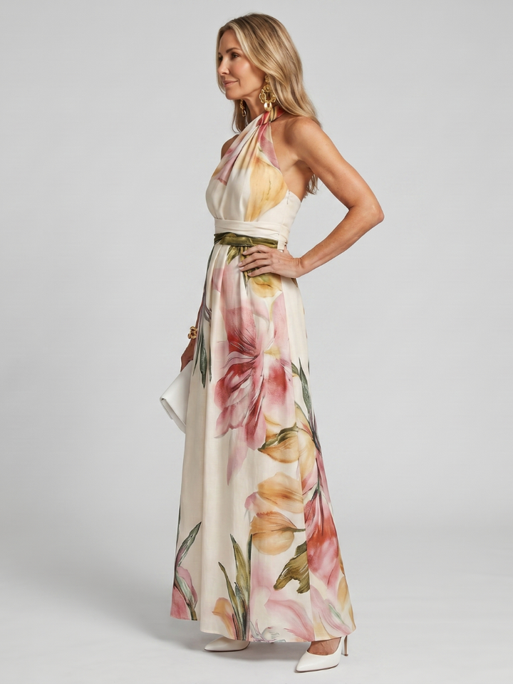 Elegant white halter maxi dress for women, featuring a flowing skirt. Ideal casual summer dress.