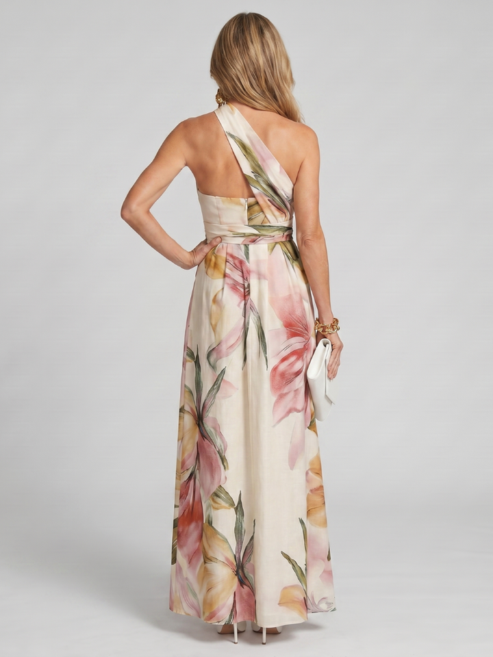 Chic pink halter maxi dress with a beautiful flowing skirt. Comfortable women's casual summer dress.