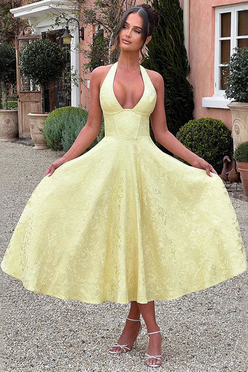 Sophisticated halterneck maxi dress for women, perfect for elegant evening events & parties.