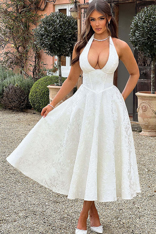 Stunning A-line prom dress with halterneck, a beautiful maxi gown for special occasions.