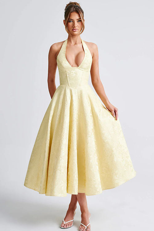 Flowy special occasion halterneck maxi dress, an elegant evening gown for women.