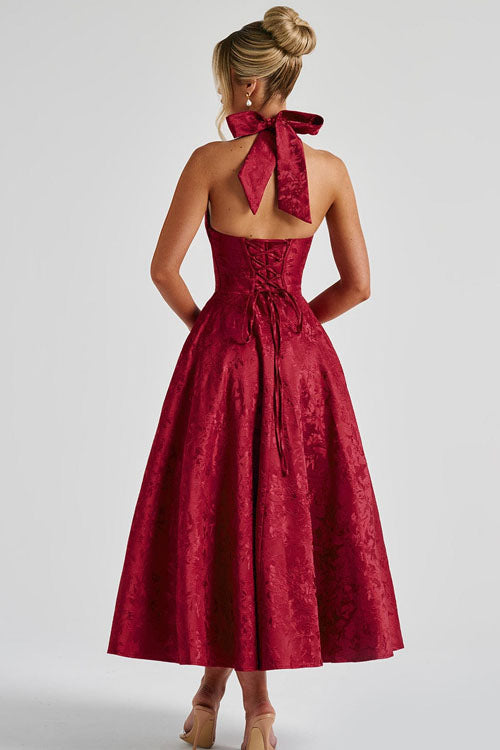 Stunning A-line evening dress with halterneck, a beautiful maxi gown for parties.