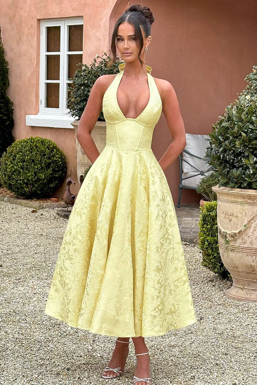 Women's elegant halterneck prom dress, a stunning maxi gown for evening events.