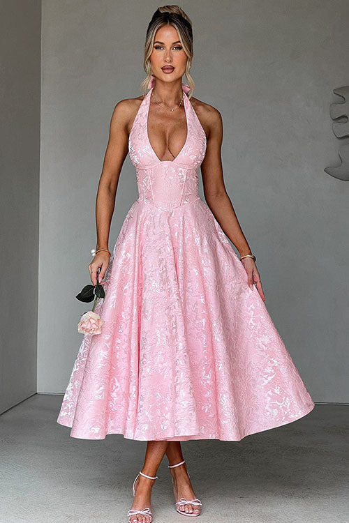 Flowing maxi halterneck gown, ideal for homecoming, prom, or elegant evening wear.