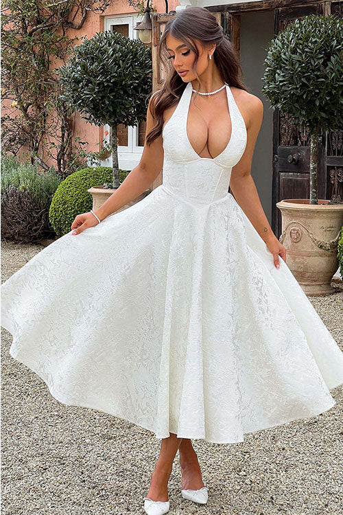 Graceful prom halterneck maxi dress, an elegant formal gown for memorable evenings.