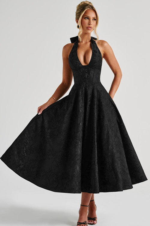 Women's A-line halterneck evening dress, a stylish maxi gown for formal parties.
