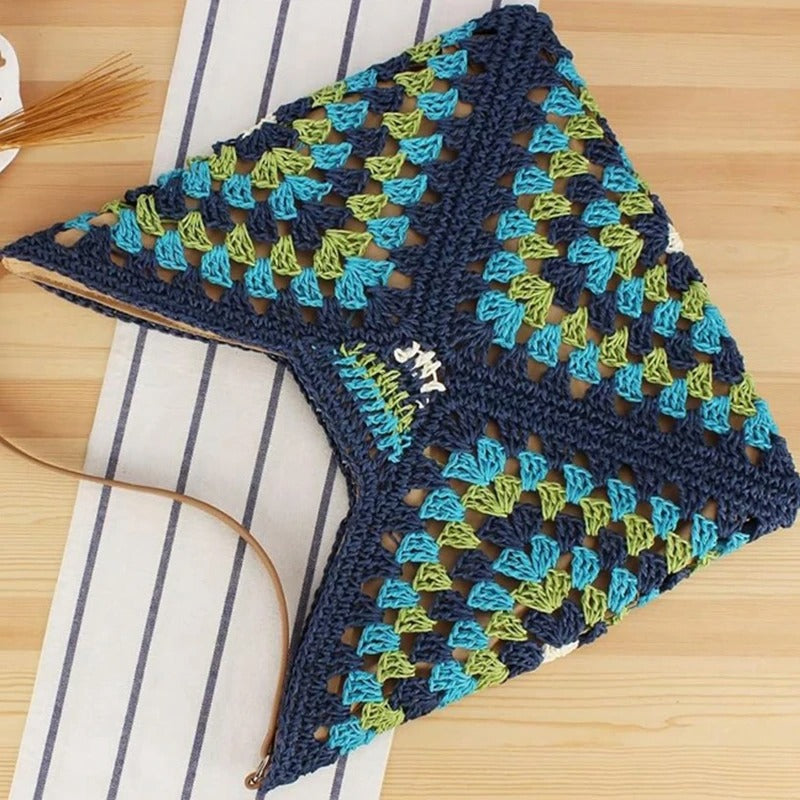Packable women's lightweight tote bag, handcrafted crochet in vibrant boho design.