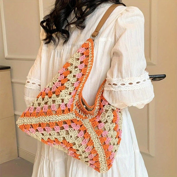 Stylish women's boho shoulder bag, handcrafted crochet design, lightweight & casual.