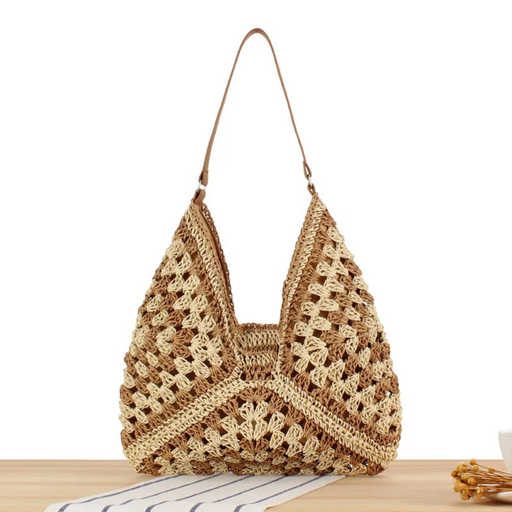 Women's fashion boho tote bag, vibrant crochet, perfect as a stylish summer accessory.