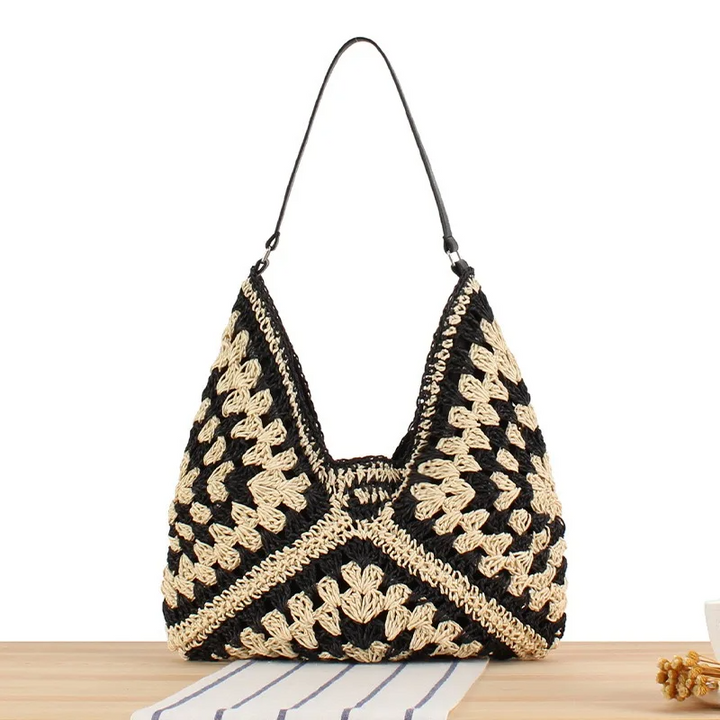 Hand-crocheted women's shoulder bag, boho style, lightweight & ideal for casual outings.