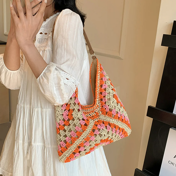 Vibrant hand-crocheted tote bag for women, ideal summer accessory & packable fashion.