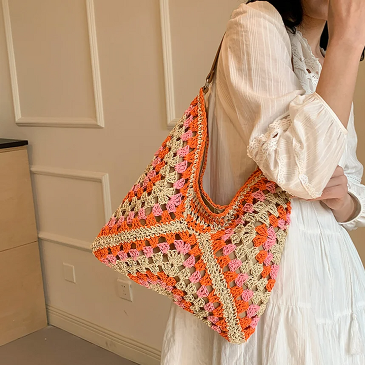 Boho style women's crochet tote bag, a handcrafted shoulder accessory for casual use.