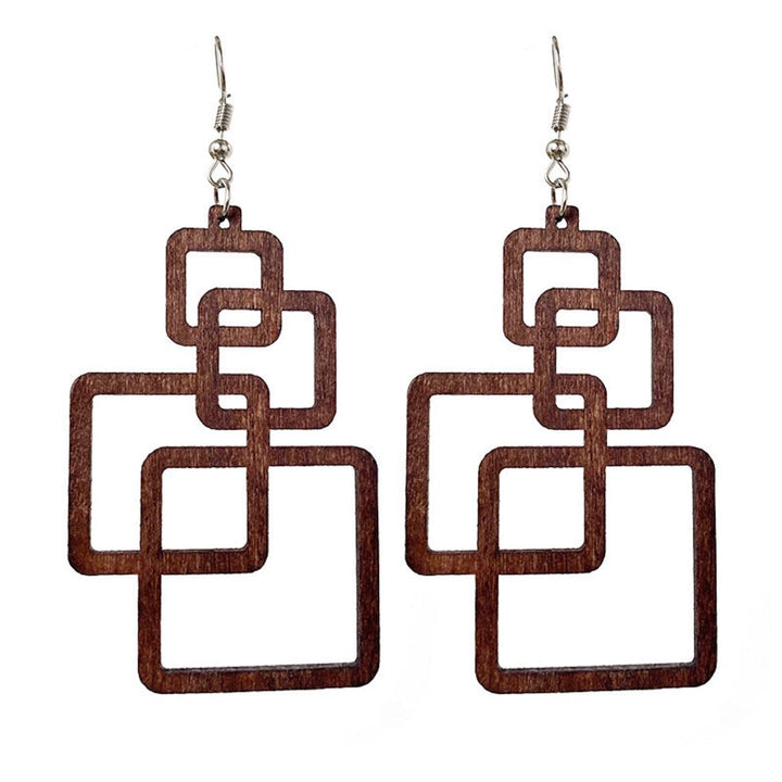 Women's handcrafted wooden drop earrings, eco-friendly & lightweight. Unique artisan fashion accessory.