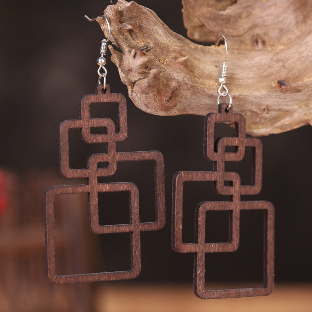 Unique women's statement drop earrings, handcrafted from wood. Eco-friendly fashion jewelry for her.