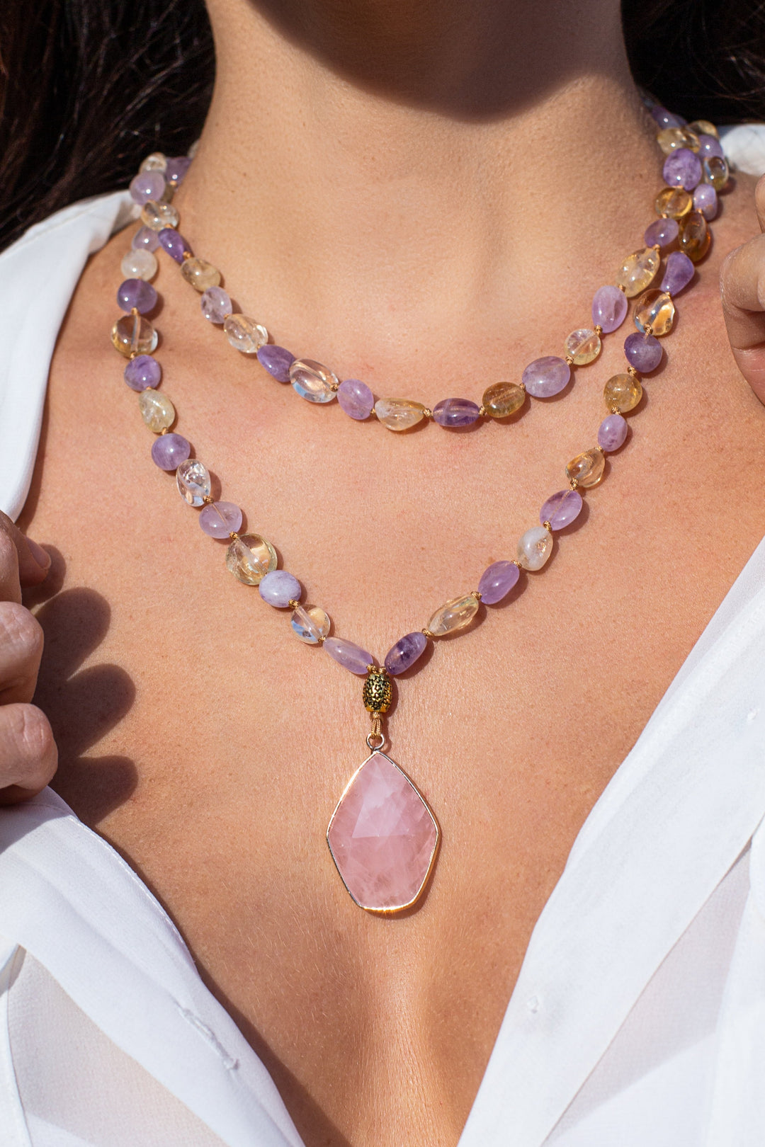 Close-up of Seraphina women's mala necklace with rose quartz, amethyst, and topaz gemstones, perfect for meditation.