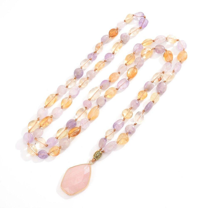 Calming Seraphina women's gemstone mala necklace featuring rose quartz & amethyst, ideal for spiritual healing & meditation.