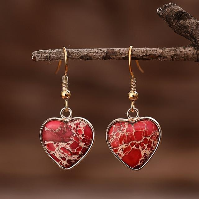 Artisan women's dangle earrings with heart-shaped Ruby Essence Jasper. Natural red gemstone spiritual jewelry.