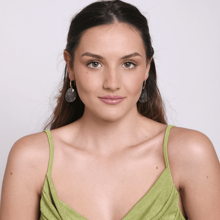 Dreamy women's labradorite crystal drop earrings. Handcrafted gemstone jewelry, a unique spiritual fashion accessory.