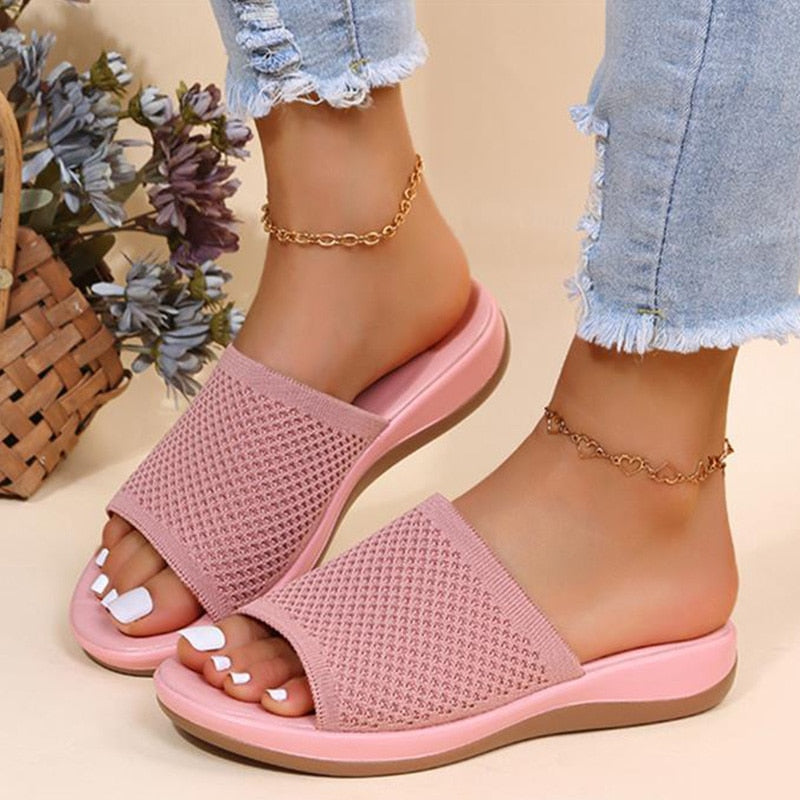 Stylish handmade retro sandals for women. Vintage open-toe flats offering summer comfort.