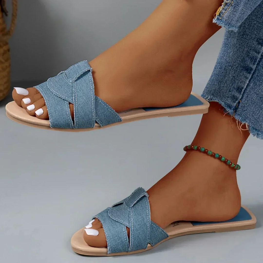 Comfortable women's Harper flat sandals. Open-toe, slip-on slides for casual, effortless summer footwear.