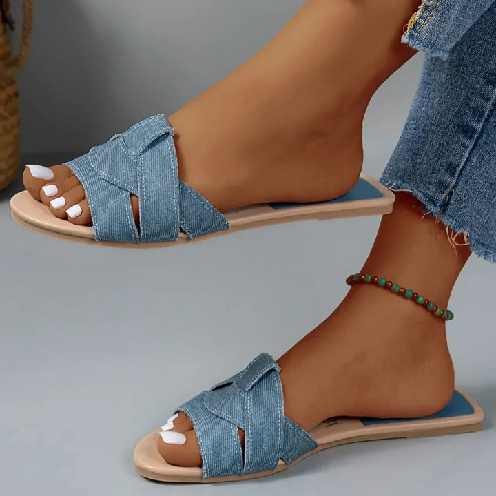 Comfortable women's Harper flat sandals. Open-toe, slip-on slides for casual, effortless summer footwear.