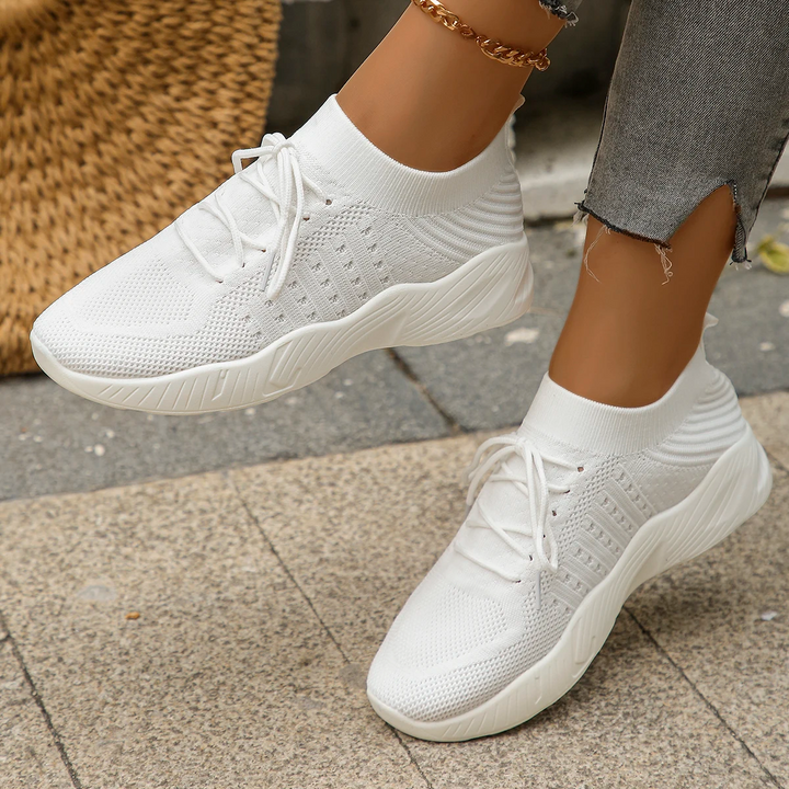 White Haven women's slip-on comfort sneakers, stretch fit for casual walking.