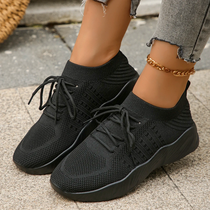 Black Women's Haven slip-on athletic sneakers, stretch design, perfect for everyday comfort.