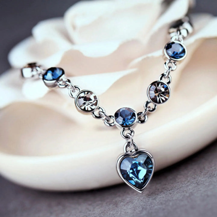 Dazzling Heart of the Ocean crystal bracelet for women, sparkling blue heart, elegant ocean-inspired jewelry.