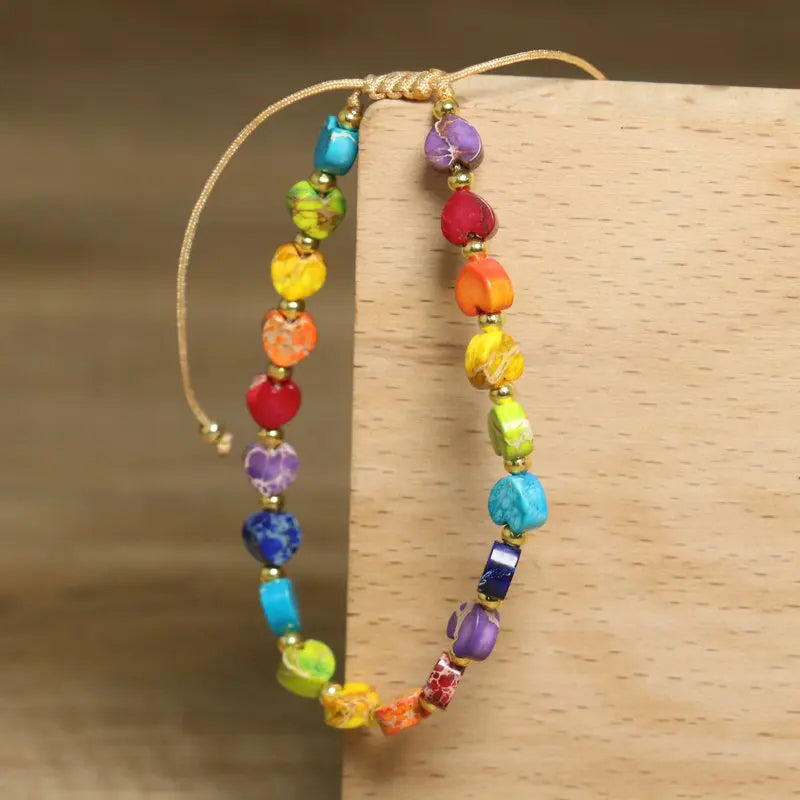 Delicate heart-shaped gemstone bracelet for women, natural stone beads with a subtle gold accent.