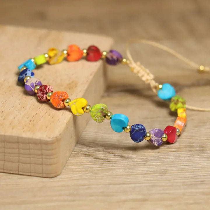 Adjustable women's heart gemstone bracelet, natural stone beads in a vibrant, stackable design.