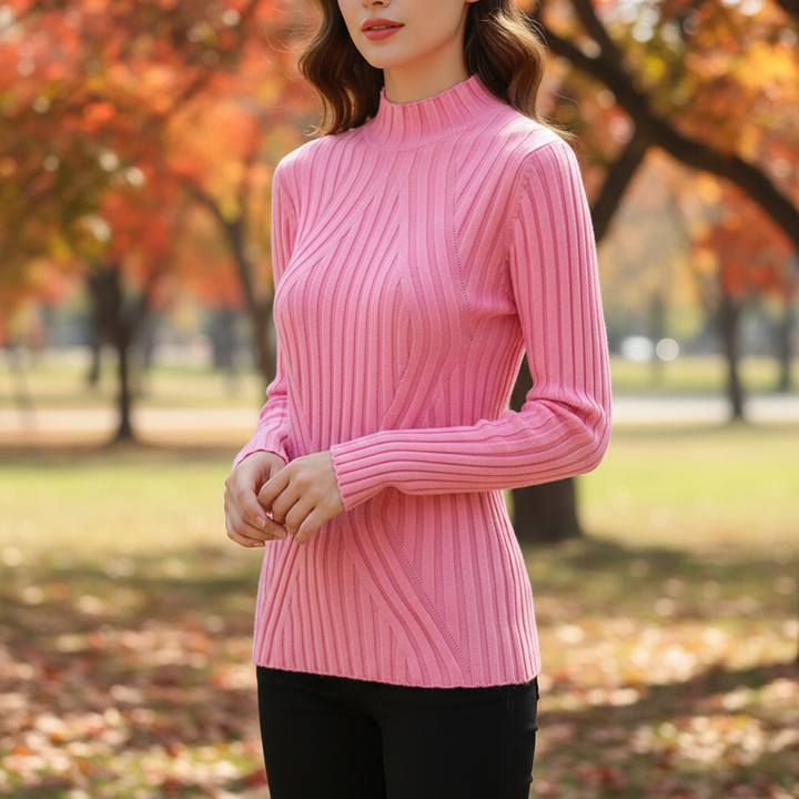 Women's high collar knitted long sleeve jumper in cream, perfect for winter fashion