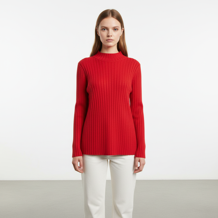 Full body shot of a woman wearing the high collar knitted long sleeve jumper, stylish