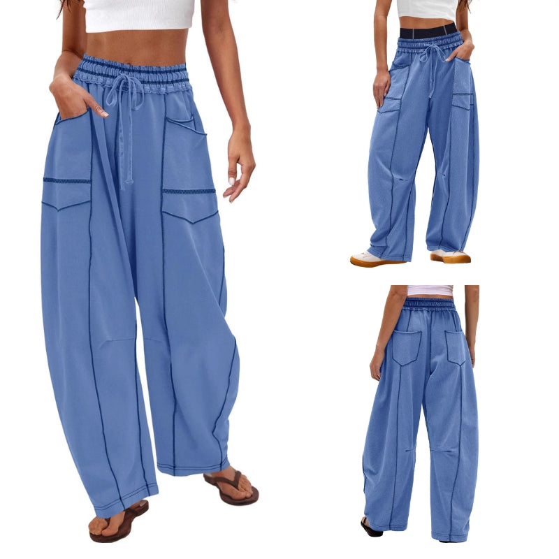Folded women's high-rise barrel sweatpants, emphasizing comfortable fabric & relaxed, versatile design.