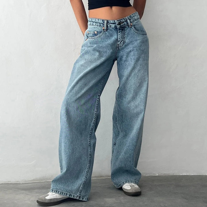 Women's high-rise flowing straight leg jeans, perfect for comfortable, versatile casual wear. Modern style pants.