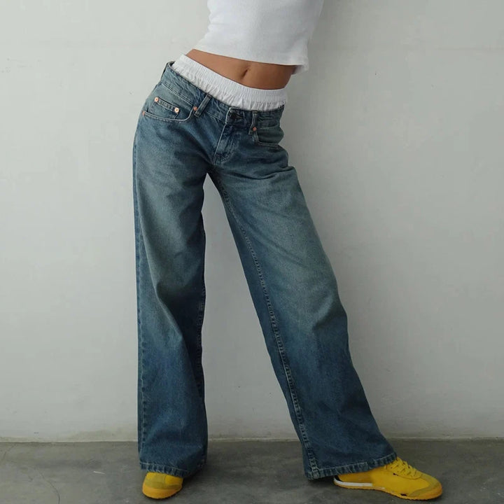 High-rise straight leg women's jeans, offering a flowing, comfortable fit. Modern and versatile pants for casual wear.