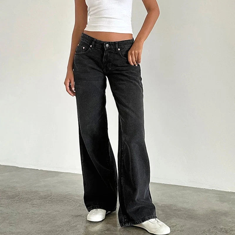 Flowing high-rise straight leg women's jeans. Comfortable and flattering fit, perfect for versatile modern casual outfits.