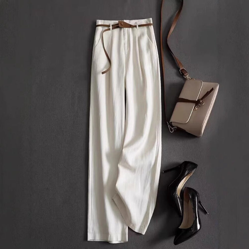 Women's high-rise flowy trousers, elegant & versatile, perfect for effortless style and comfort.