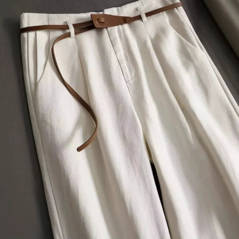 Brown high-rise flowy trousers for women, soft fabric and elegant drape for all-day comfort.
