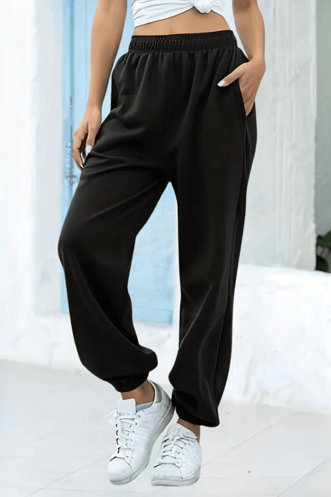 High-rise women's joggers with elastic waist, ideal for active or lounging comfort.